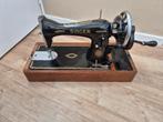Oude naaimachine Singer, Ophalen
